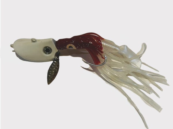Striper-Gear crawler lure for fishing for black sea bass. Pictured here in the white color which glows underwater