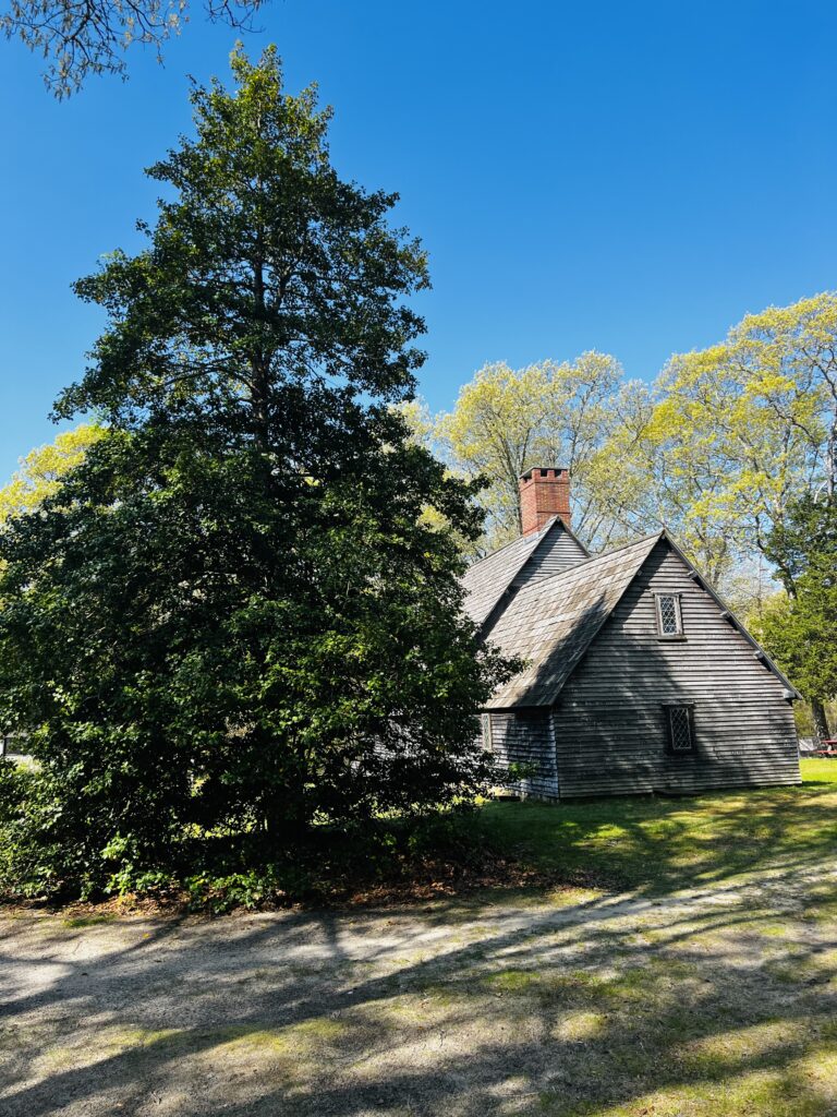Image of the replica Aptucxet Trading Post Museum taken in the spring of 2025